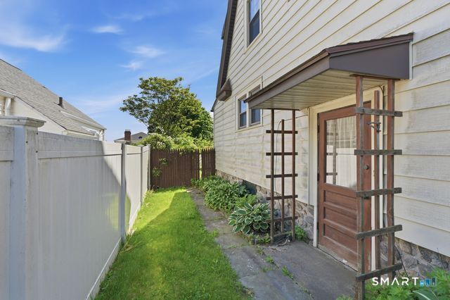 443 Highland Avenue Waterbury, CT 06708 - Photo 21 of 24 a view of a backyard