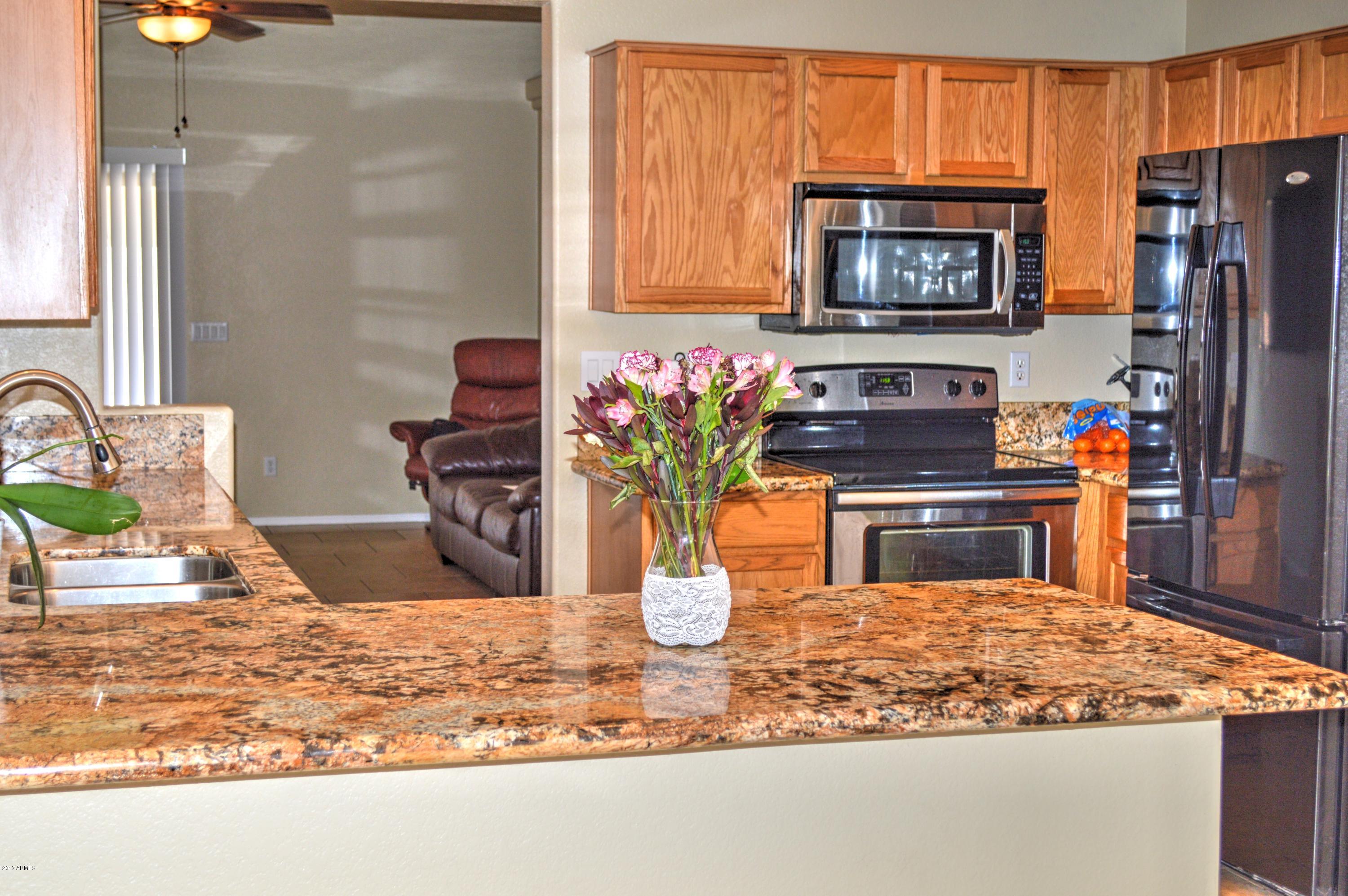 13050 West Redfield Road El Mirage, AZ 85335 - Photo 2 of 28 kitchen bar Redfield