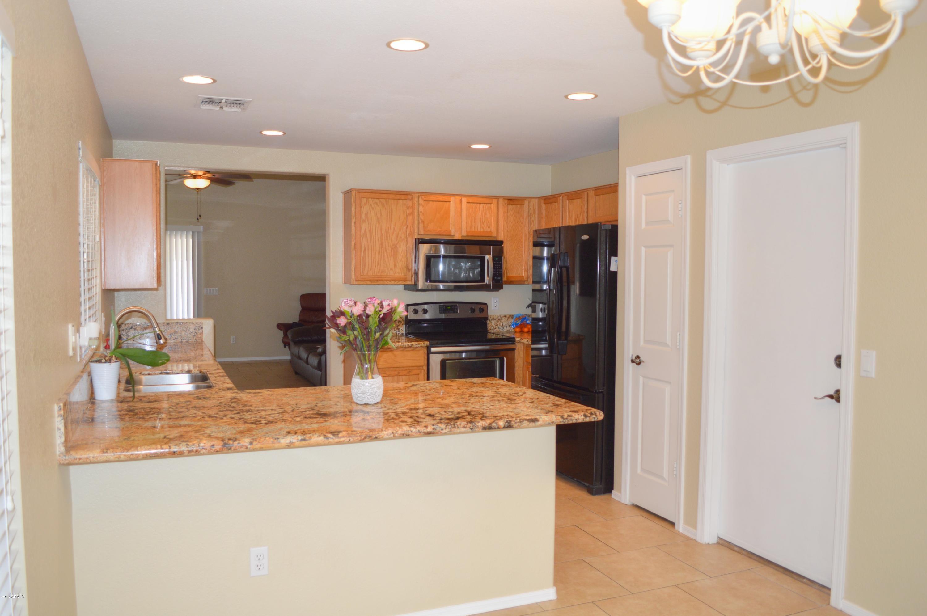 13050 West Redfield Road El Mirage, AZ 85335 - Photo 6 of 28 kitchen dining Redfield