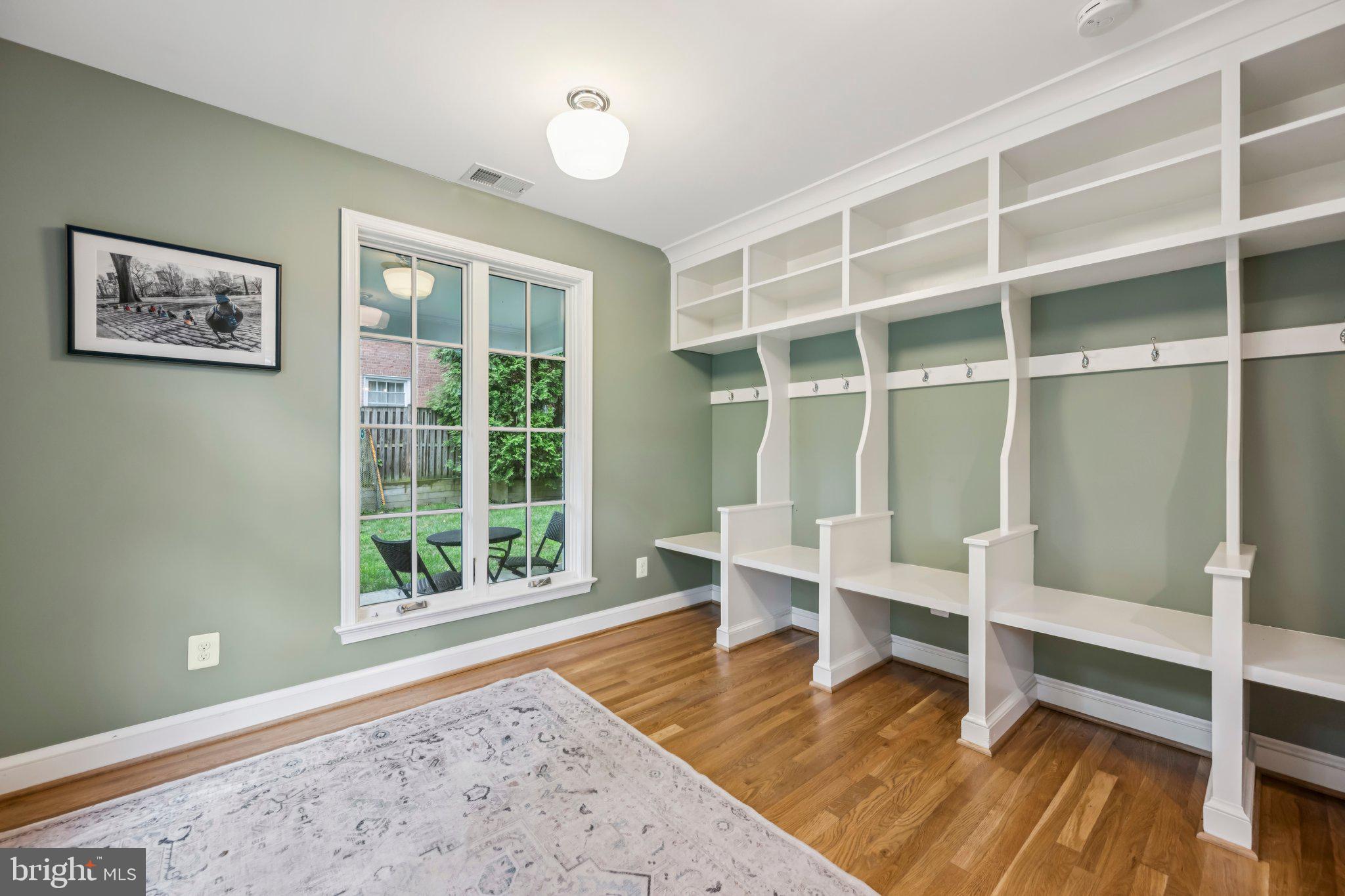 5109 River Hill Road Bethesda, MD 20816 - Photo 11 of 21 a living room with wooden floor and a window