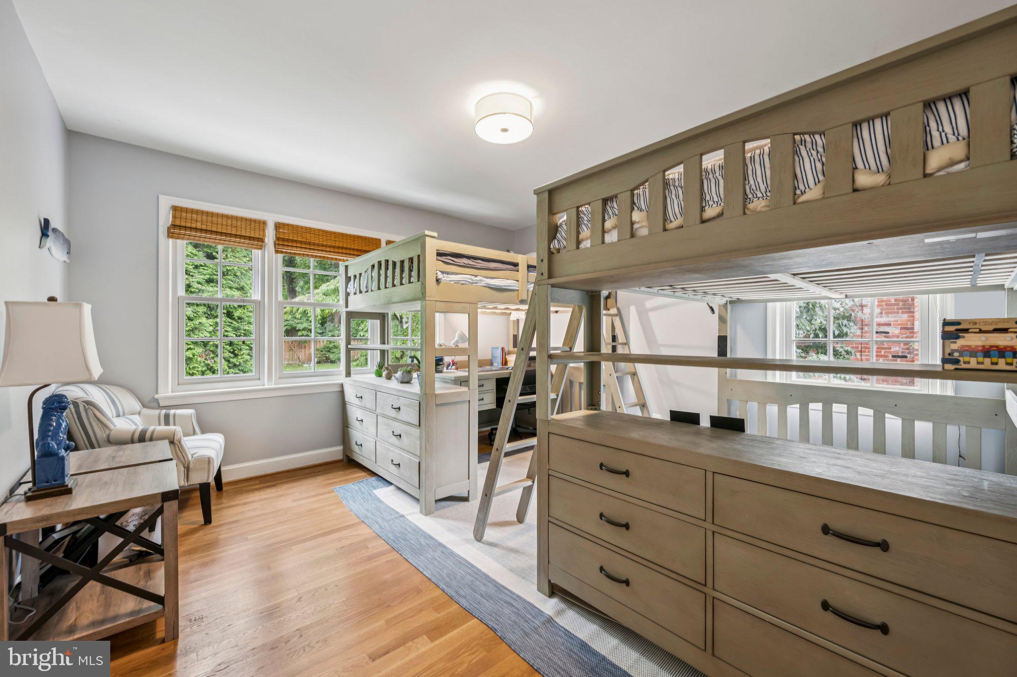 5109 River Hill Road Bethesda, MD 20816 - Photo 14 of 21 a living room with furniture and a large window