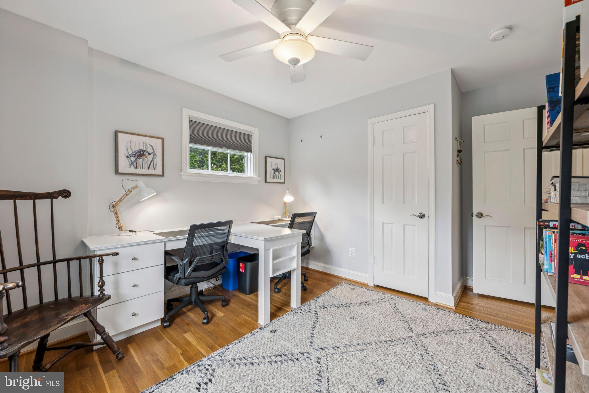 5109 River Hill Road Bethesda, MD 20816 - Photo 15 of 21 a view of a workspace with furniture and a window
