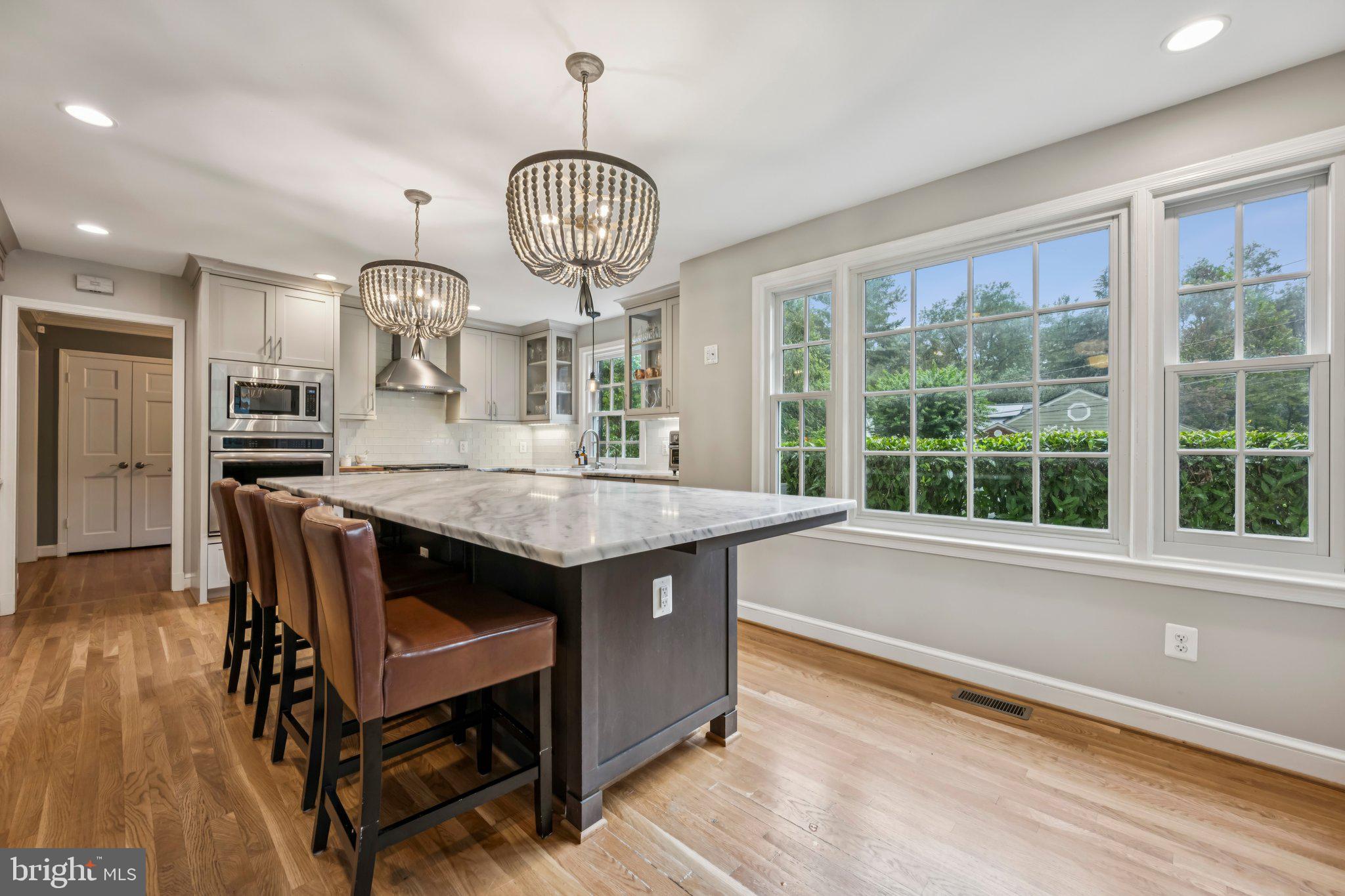 5109 River Hill Road Bethesda, MD 20816 - Photo 3 of 21 a view of dining room and wooden floor