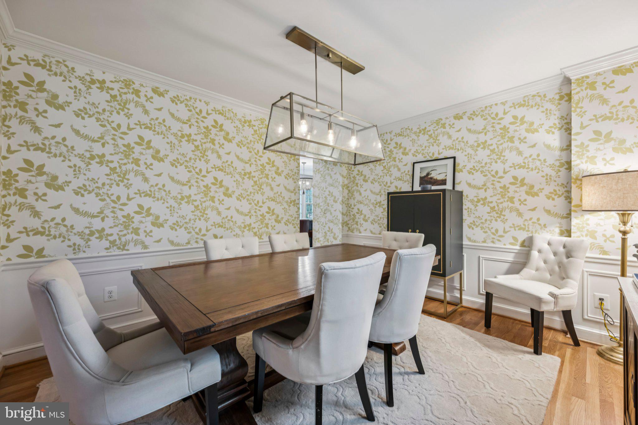 5109 River Hill Road Bethesda, MD 20816 - Photo 5 of 21 a view of a dining room with furniture and wooden floor