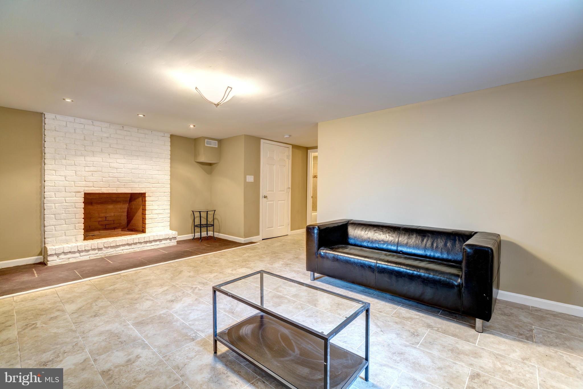 6108 Ridgeview Avenue Baltimore, MD 21206 - Photo 25 of 29 Cozy Fireplace in Family Room