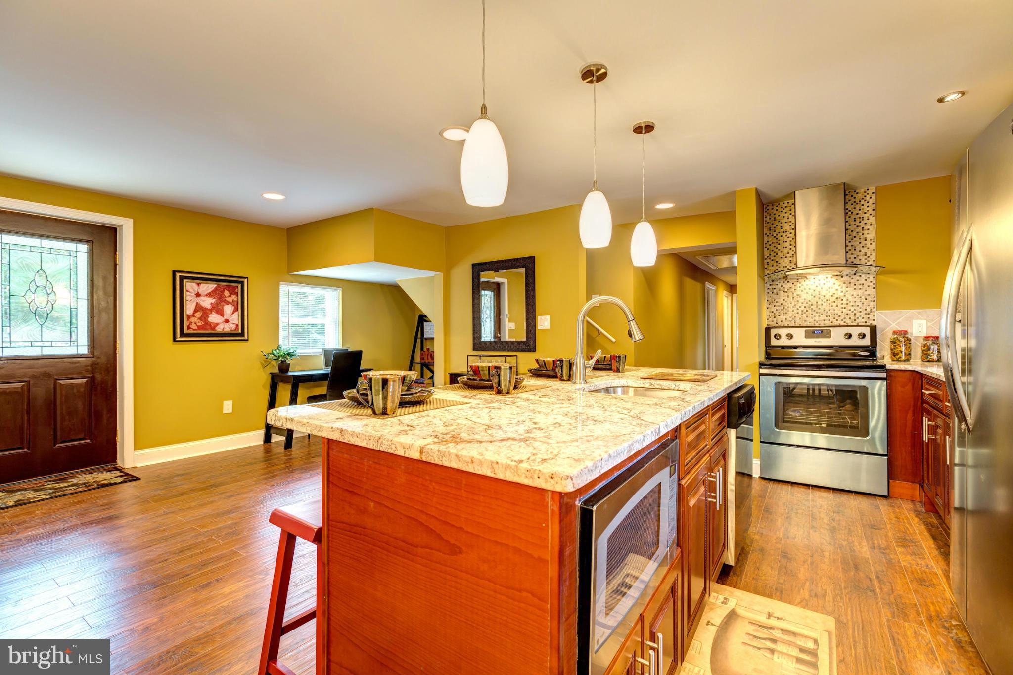 6108 Ridgeview Avenue Baltimore, MD 21206 - Photo 6 of 29 Stainless Steel Appliances and Granite Counters