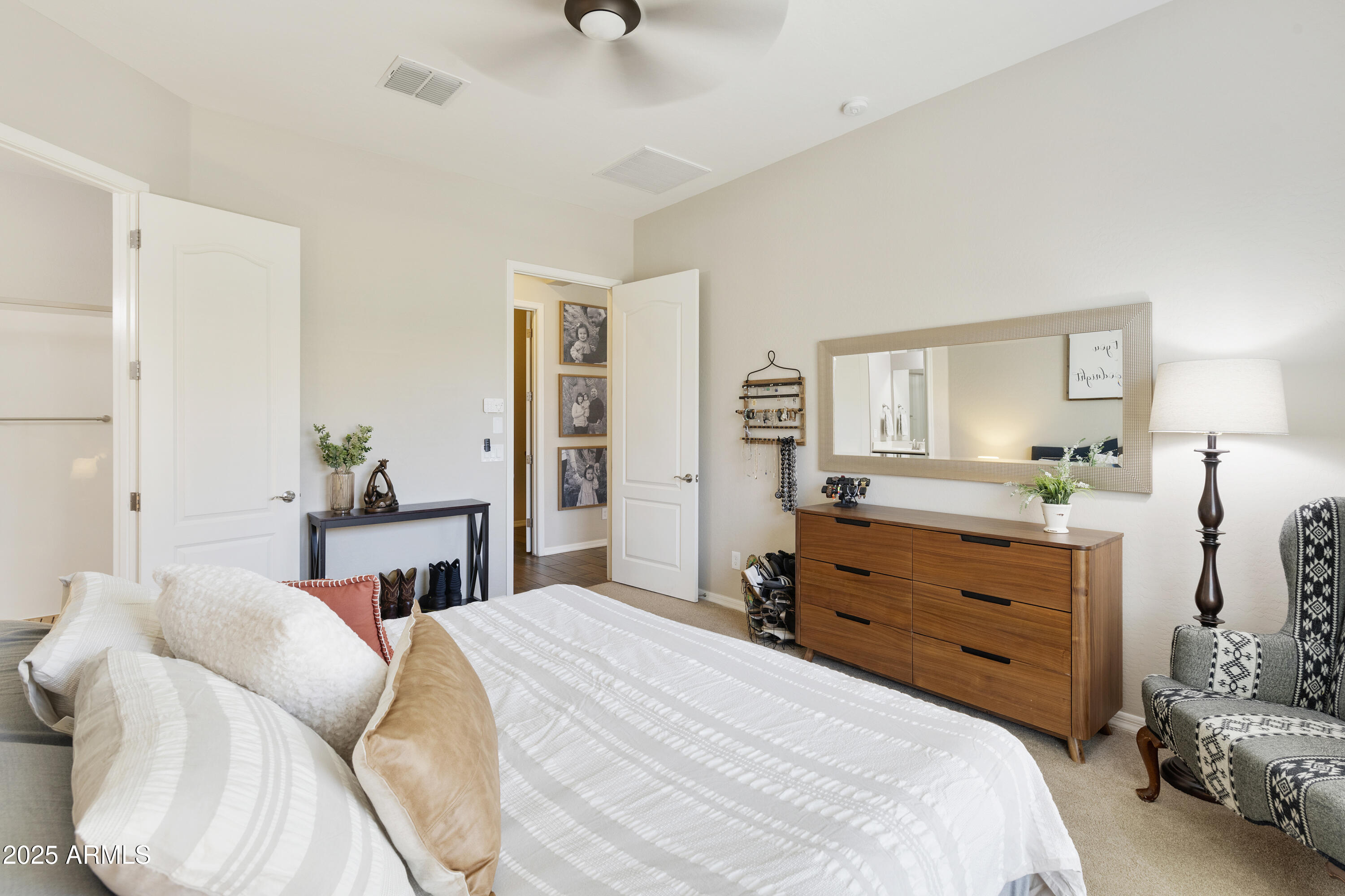 1517 West Redondo Drive Gilbert, AZ 85233 - Photo 20 of 55 a bedroom with a bed and a dresser