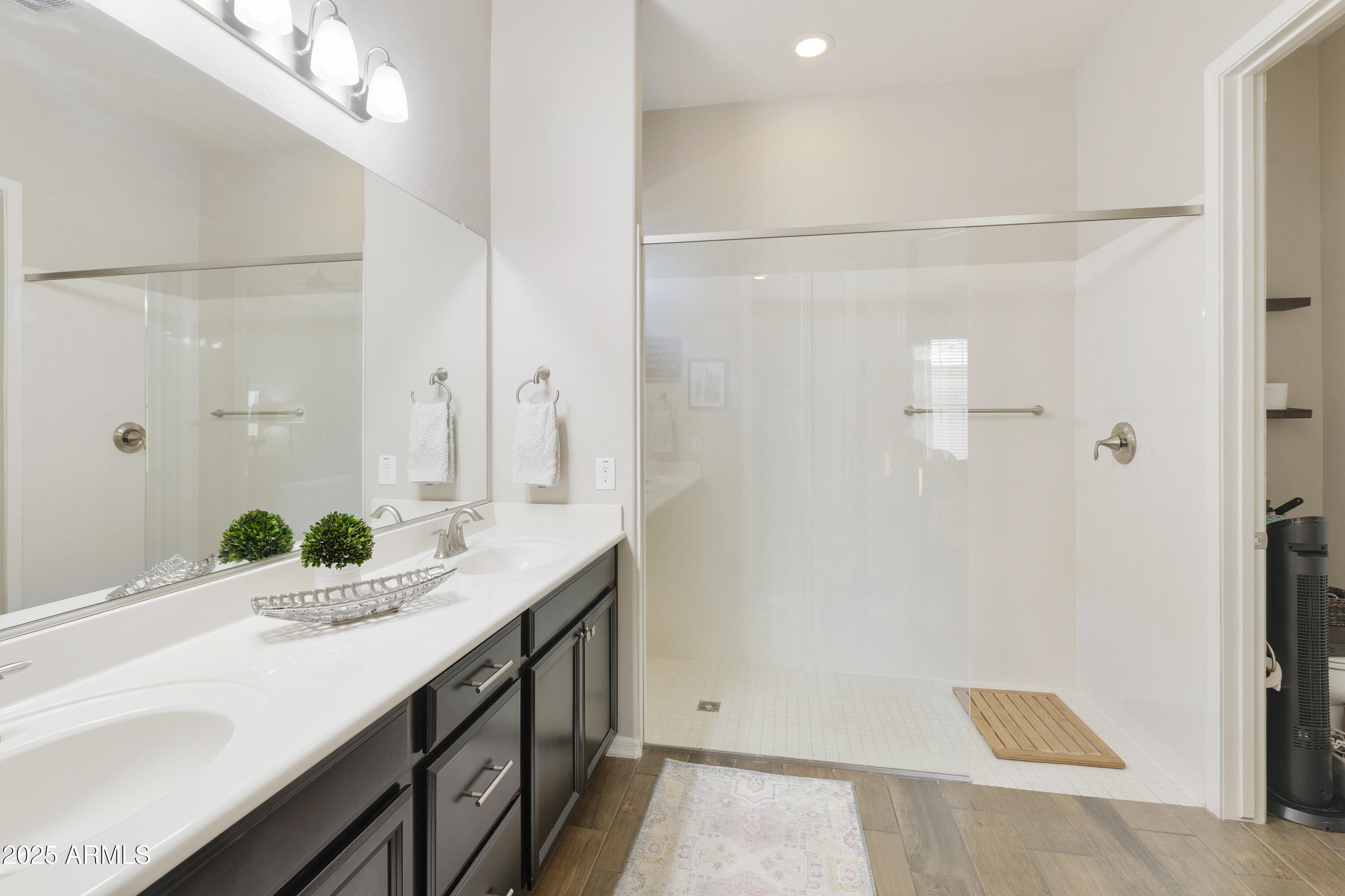 1517 West Redondo Drive Gilbert, AZ 85233 - Photo 23 of 55 a bathroom with a granite countertop shower sink and mirror