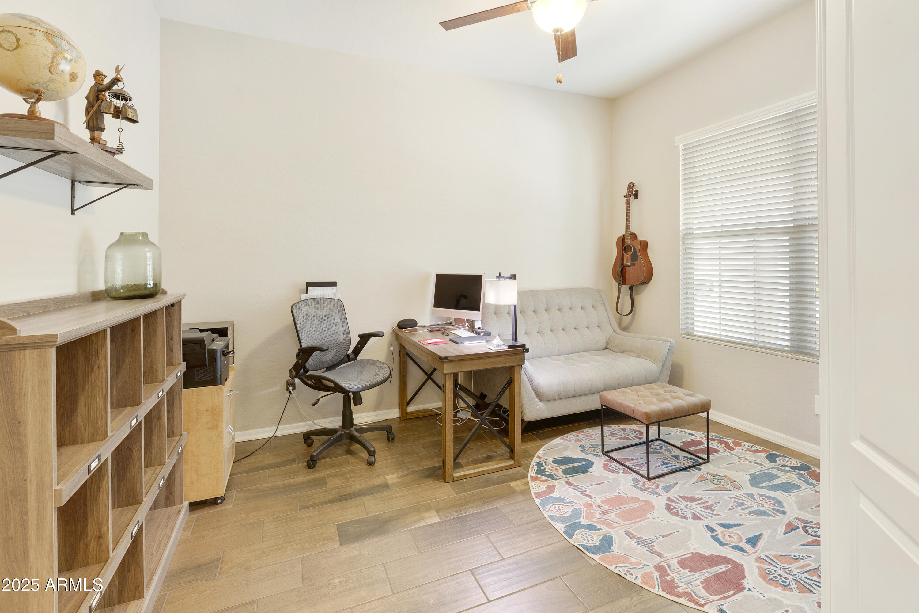 1517 West Redondo Drive Gilbert, AZ 85233 - Photo 28 of 55 a living room with furniture and a window