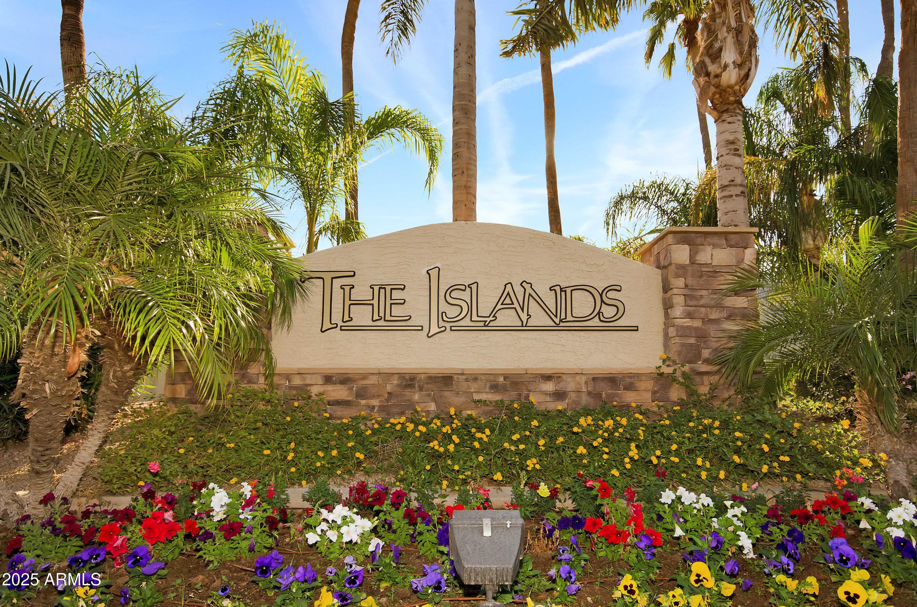 1517 West Redondo Drive Gilbert, AZ 85233 - Photo 47 of 55 a view of sign board with flower around