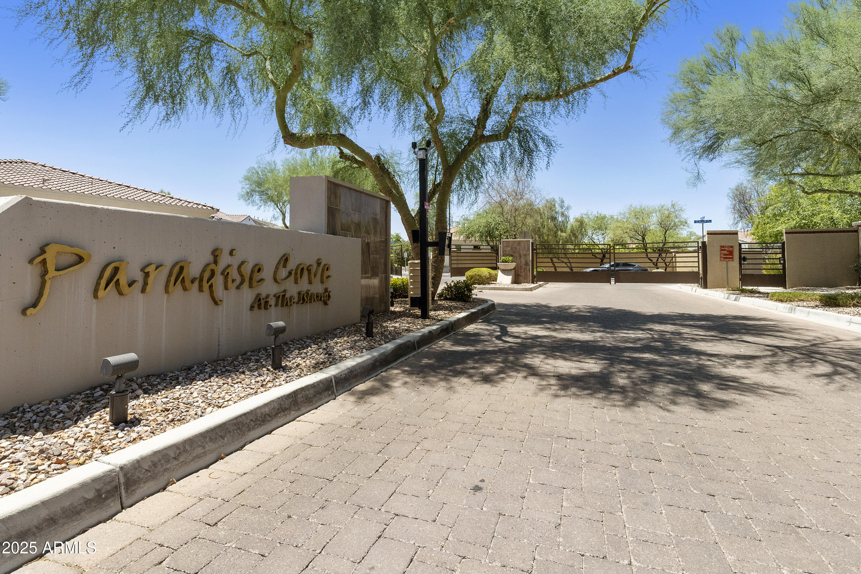 1517 West Redondo Drive Gilbert, AZ 85233 - Photo 55 of 55 a view of a street with a building in the background