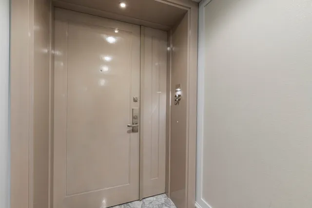 a spacious bathroom with a sink toilet and a mirror