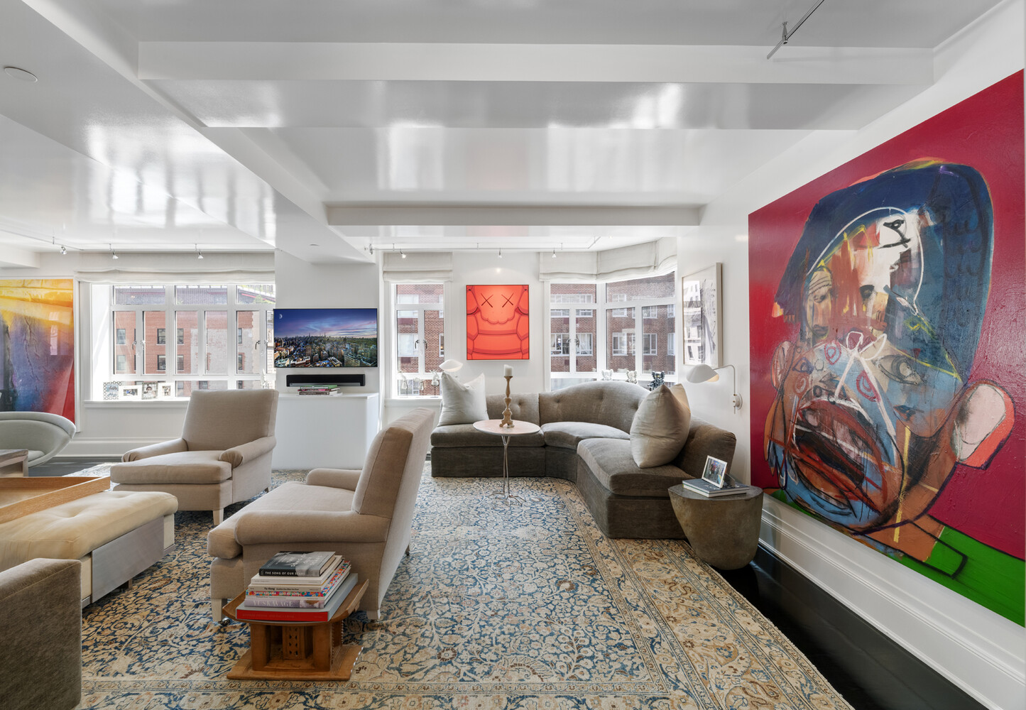 21 East 61st Street, Unit 8F Manhattan, NY 10065 - Photo 1 of 23 a living room with furniture fireplace and a window