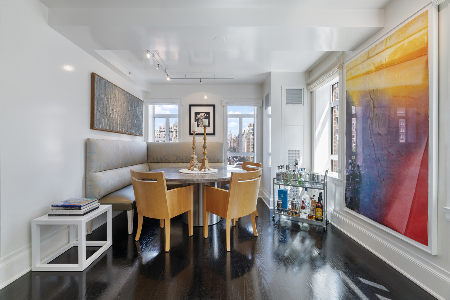 21 East 61st Street, Unit 8F Manhattan, NY 10065 - Photo 4 of 23 a dining room with furniture window and wooden floor
