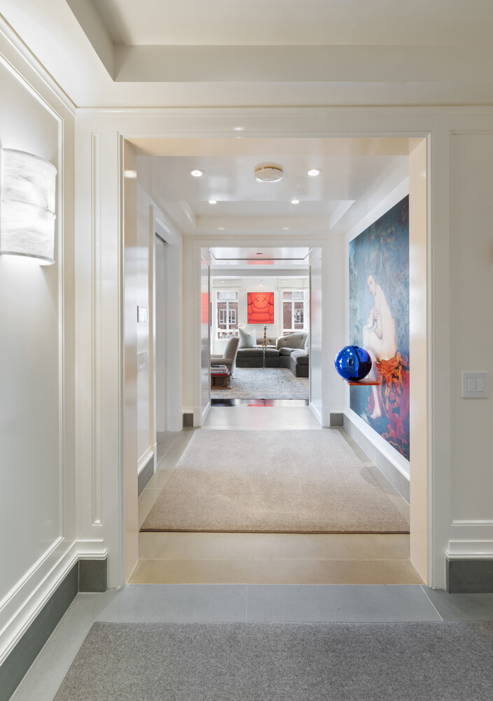 21 East 61st Street, Unit 8F Manhattan, NY 10065 - Photo 5 of 23 a living room with furniture