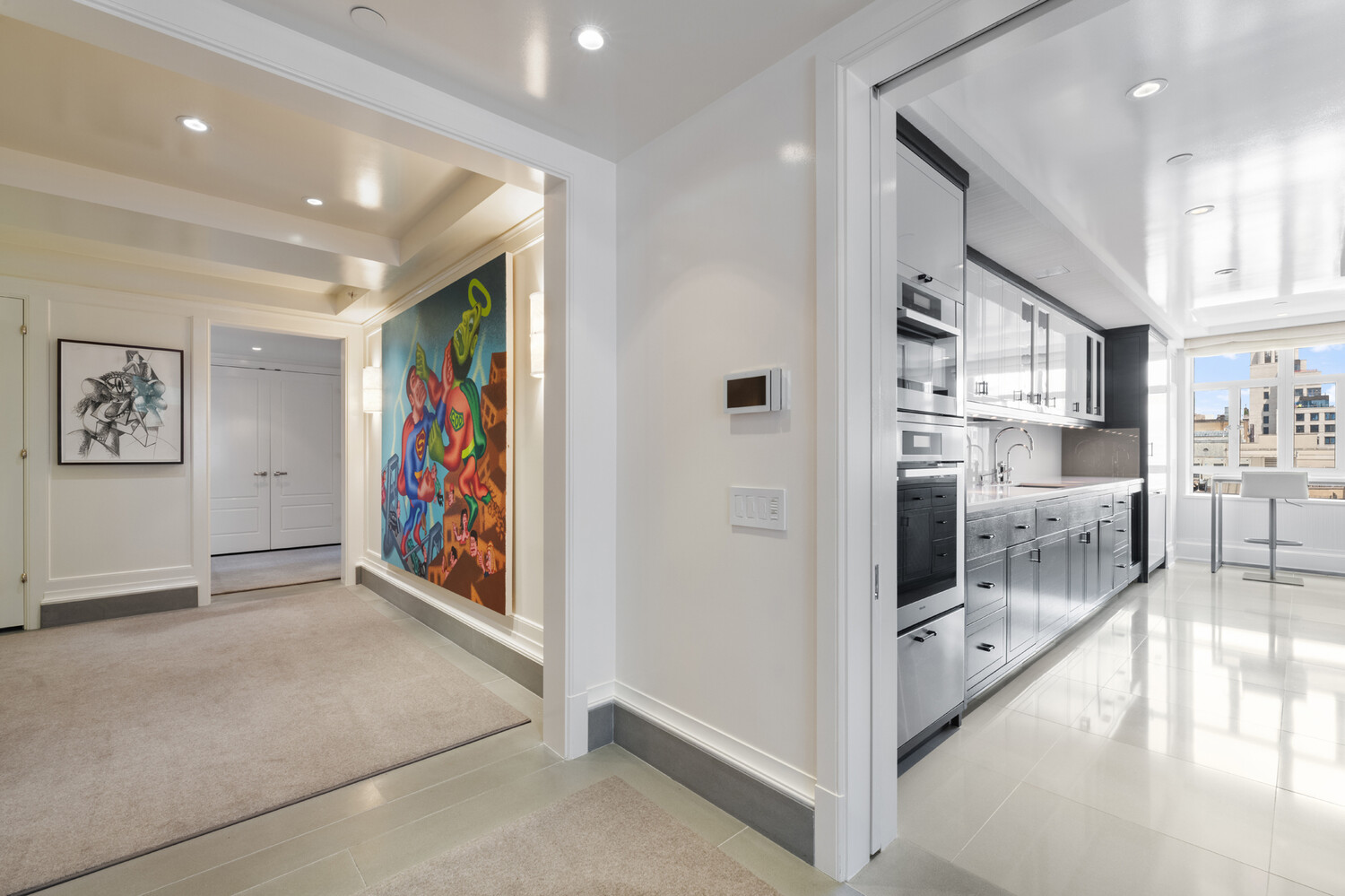 21 East 61st Street, Unit 8F Manhattan, NY 10065 - Photo 7 of 23 a view of interior space with flat screen tv