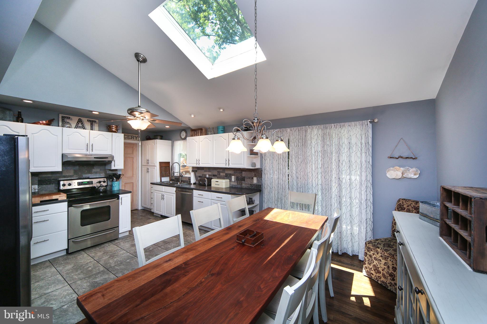 216 River Road Washington Crossing, PA 18977 - Photo 16 of 31 Kitchen and Dining with skylight