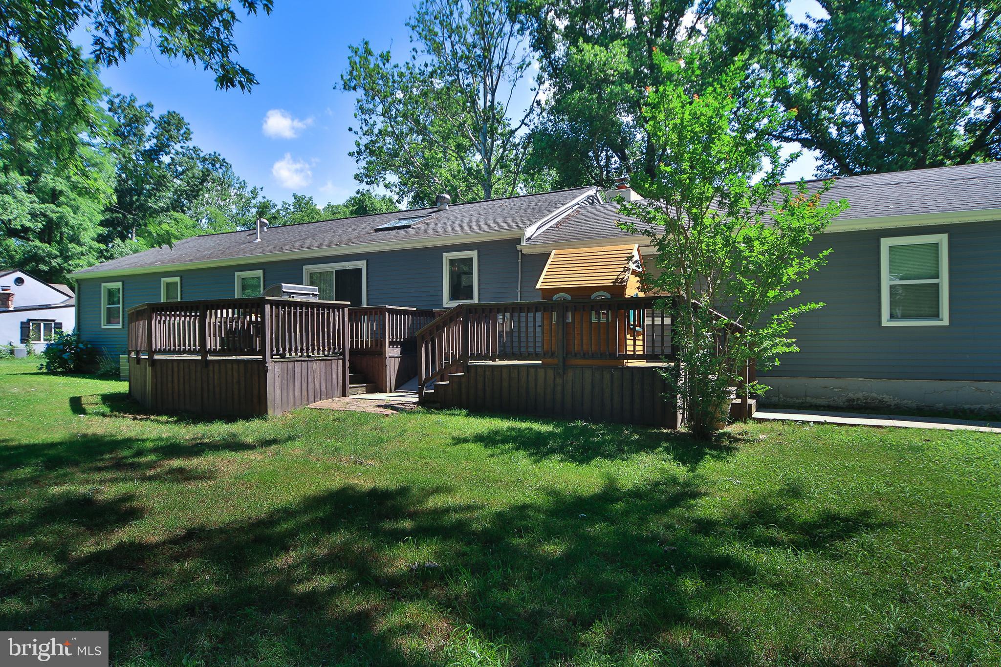 Back of the home with two deck areas