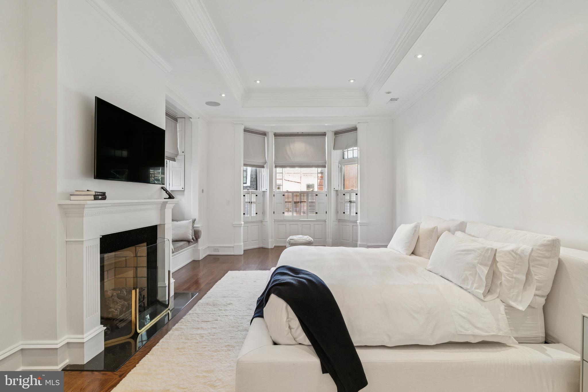 2015 Delancey Place Philadelphia, PA 19103 - Photo 17 of 38 a bedroom with a bed and a flat screen tv