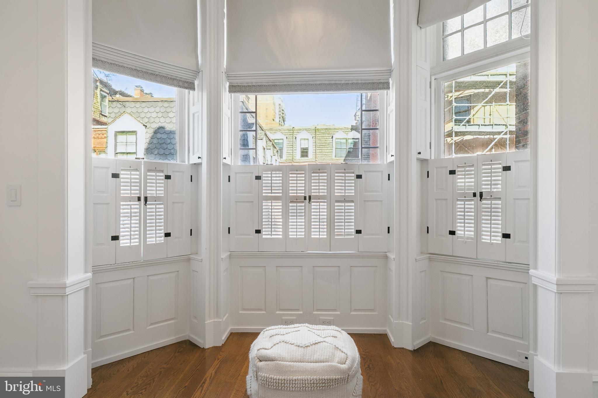 2015 Delancey Place Philadelphia, PA 19103 - Photo 19 of 38 wooden floor in an empty room with a window