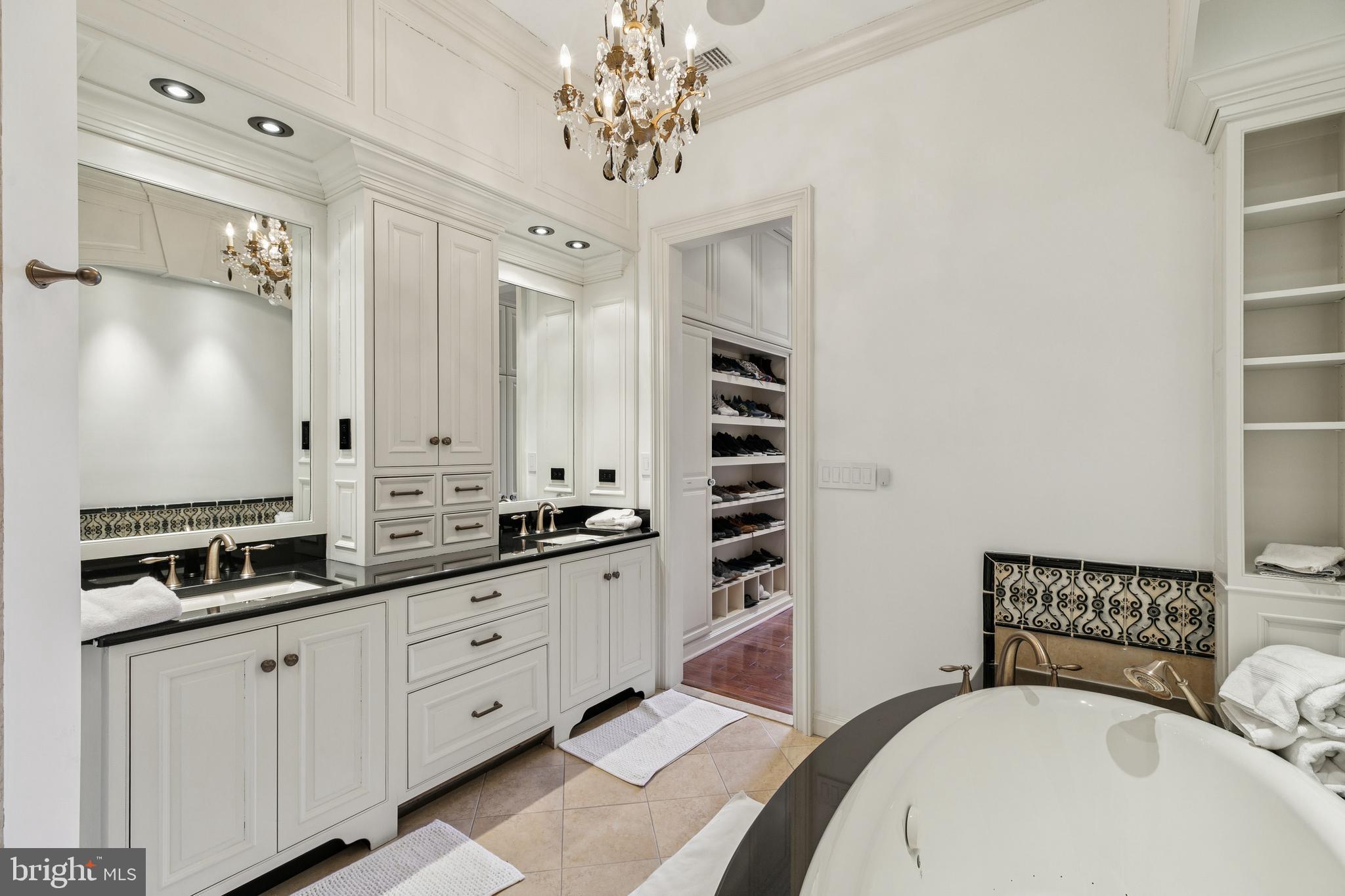 2015 Delancey Place Philadelphia, PA 19103 - Photo 21 of 38 a kitchen with granite countertop a sink a stove and cabinets