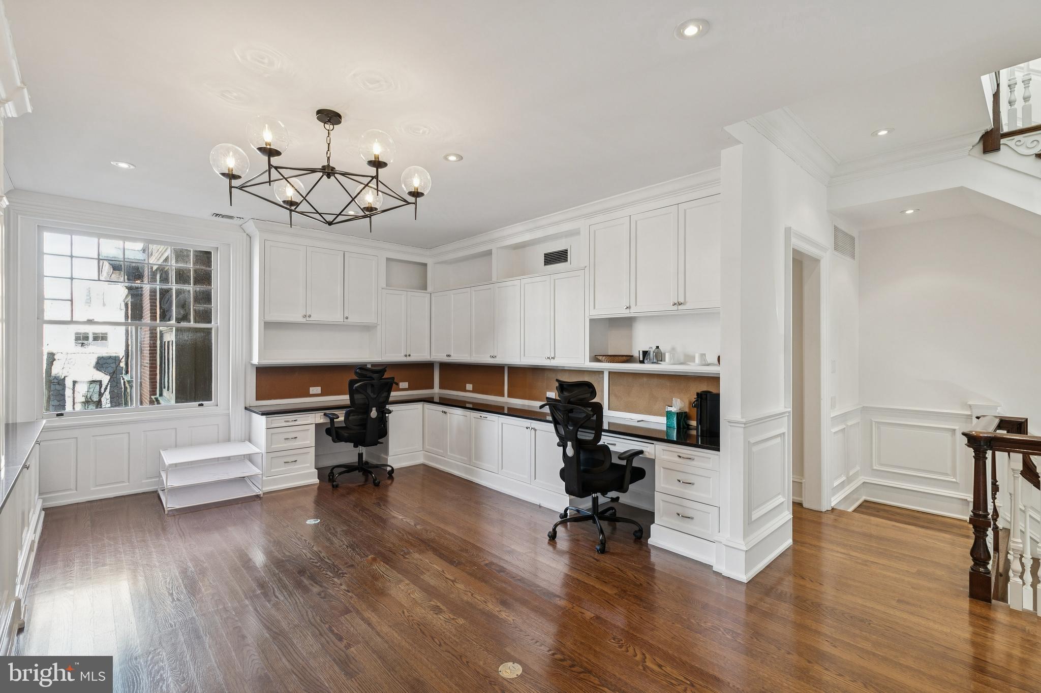 2015 Delancey Place Philadelphia, PA 19103 - Photo 24 of 38 a view of kitchen with dining table wooden floor and stainless steel appliances