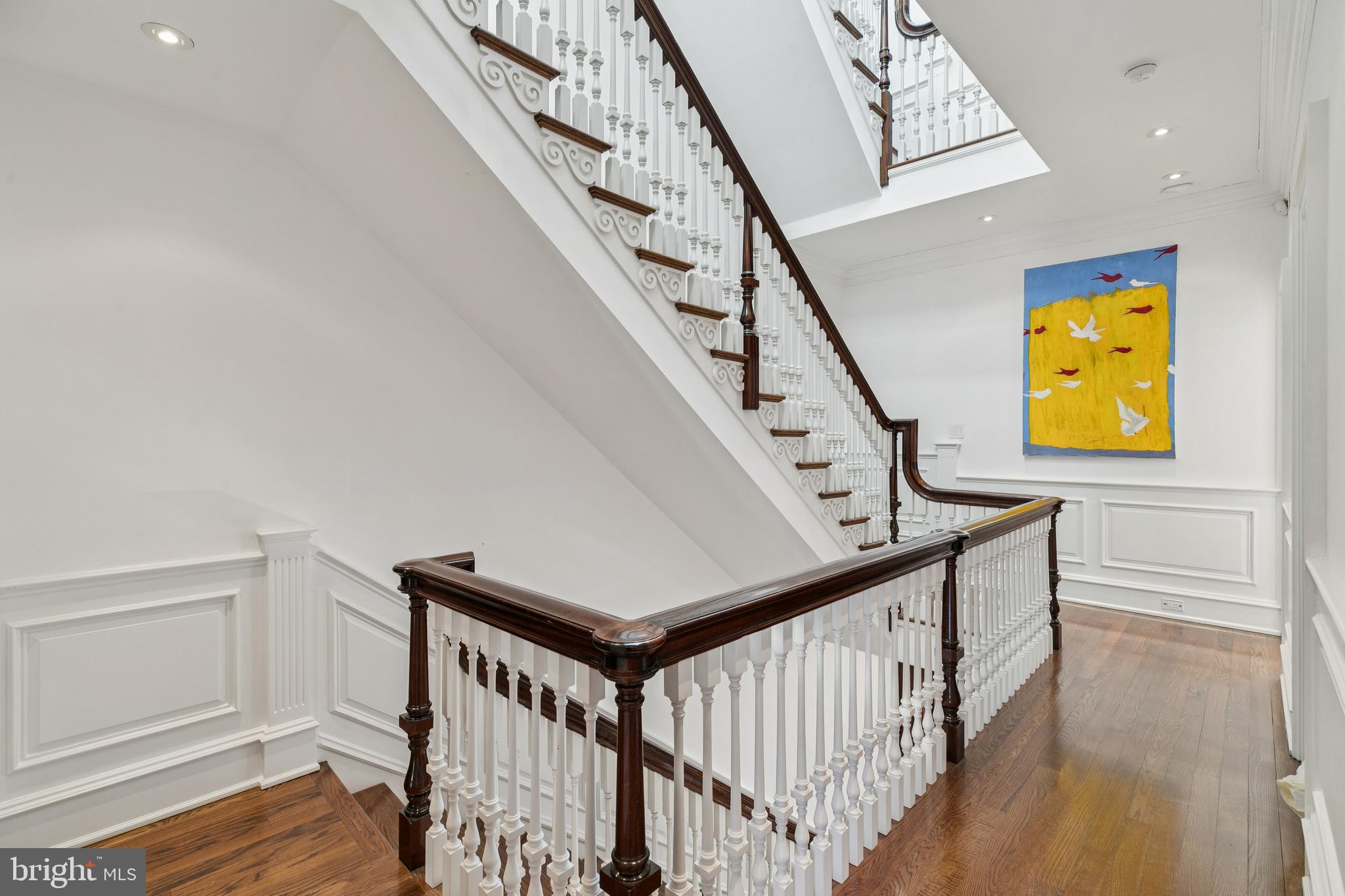 2015 Delancey Place Philadelphia, PA 19103 - Photo 25 of 38 a view of staircase with wooden floor and white walls