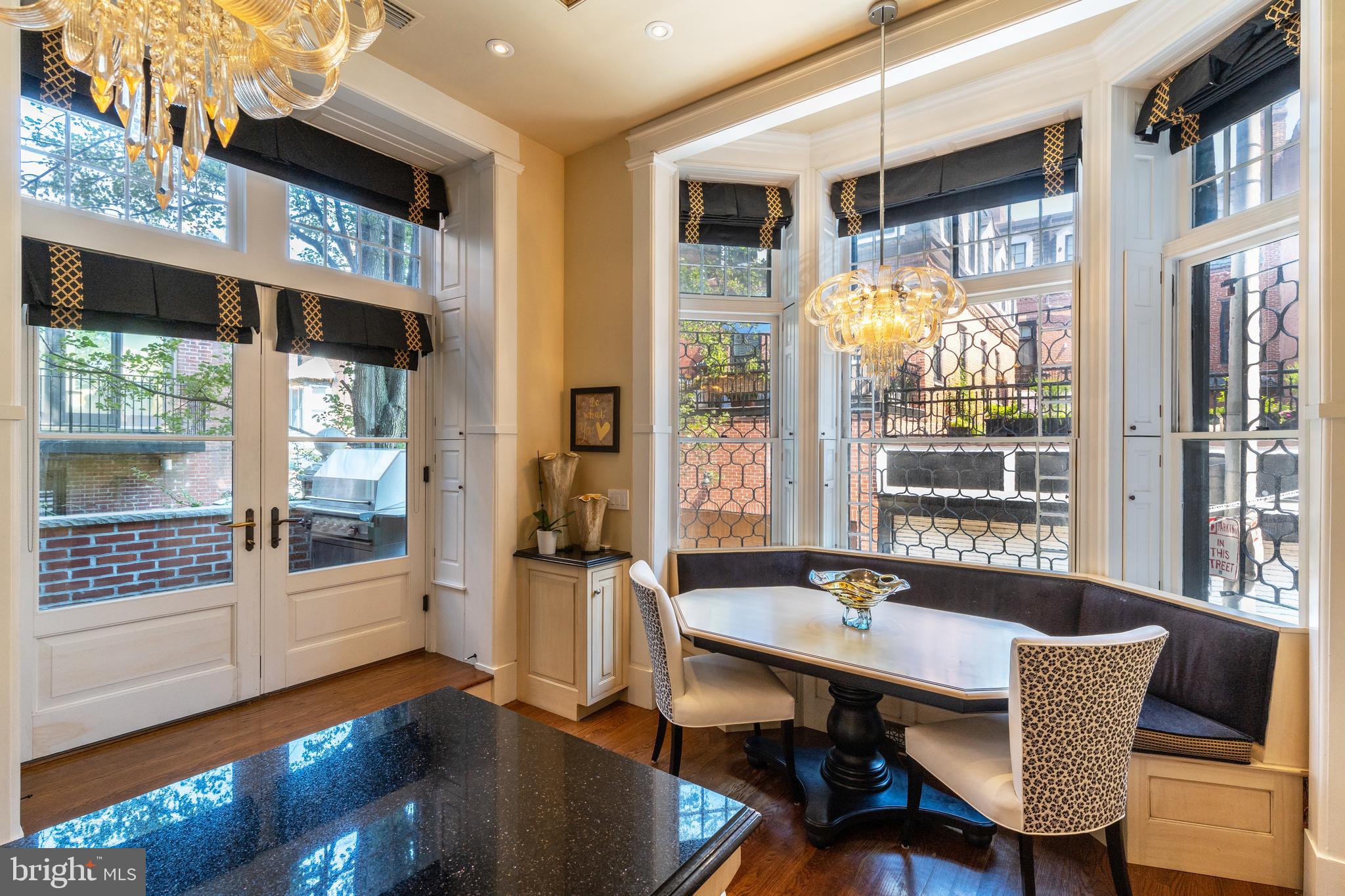 2015 Delancey Place Philadelphia, PA 19103 - Photo 10 of 38 a view of a dining room with furniture window and wooden floor