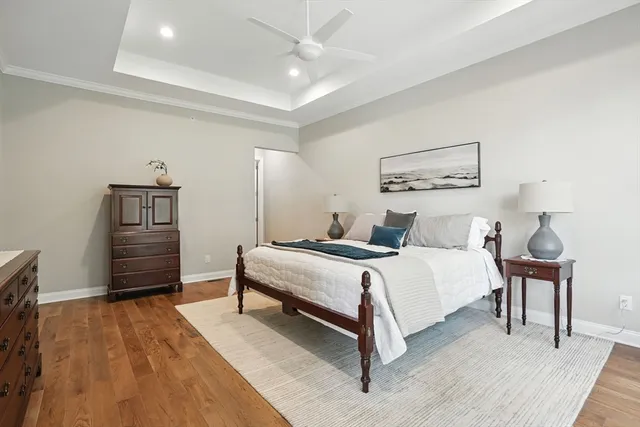 a bed room with a bed and dresser