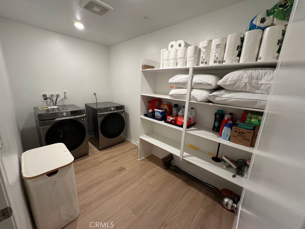 2511 Gunner Ridge Way Rialto, CA 92377 - Photo 18 of 37 a room with storage and utility