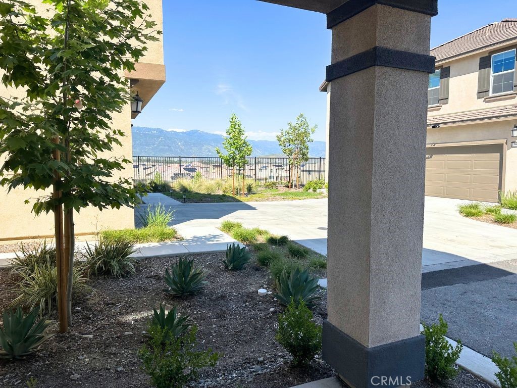 2511 Gunner Ridge Way Rialto, CA 92377 - Photo 7 of 37 a view of a house with backyard and sitting area