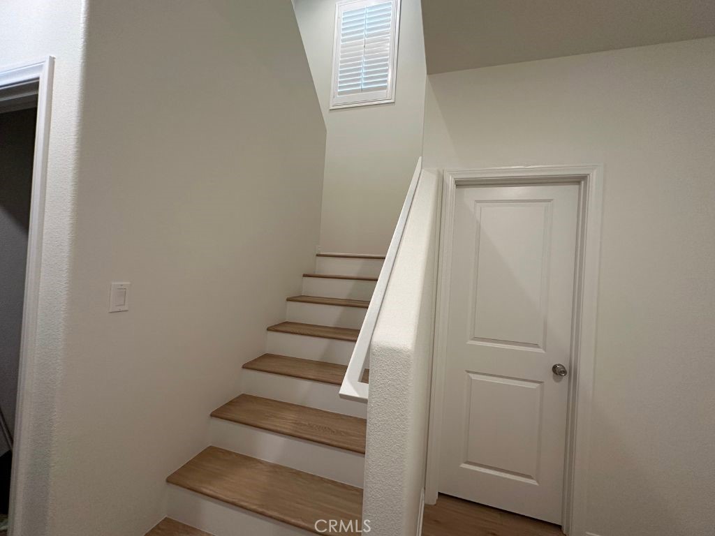 2511 Gunner Ridge Way Rialto, CA 92377 - Photo 9 of 37 a view of entryway with wooden floor
