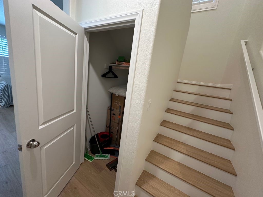 2511 Gunner Ridge Way Rialto, CA 92377 - Photo 10 of 37 a view of hallway with stairs