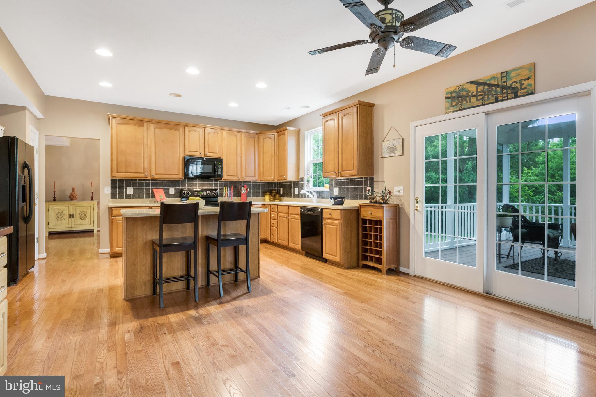 1239 Painted Fern Road Denton, MD 21629 - Photo 22 of 47 Casual in-kitchen dining area + island seating