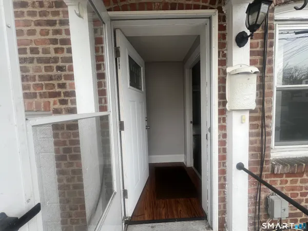 a view of a balcony from a hallway