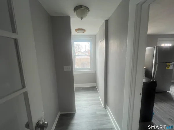 a view of hallway with stairs