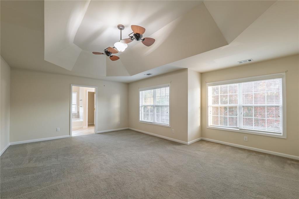 1280 Hidden Creek Point Cumming, GA 30040 - Photo 29 of 62 a view of an empty room with a window
