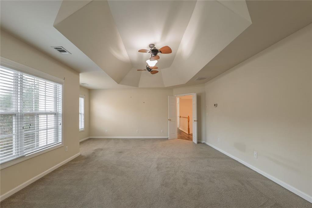 1280 Hidden Creek Point Cumming, GA 30040 - Photo 31 of 62 a view of an empty room with a window