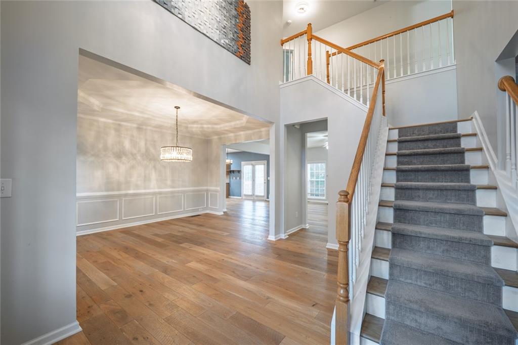1280 Hidden Creek Point Cumming, GA 30040 - Photo 4 of 62 a view of entryway and hall with wooden floor