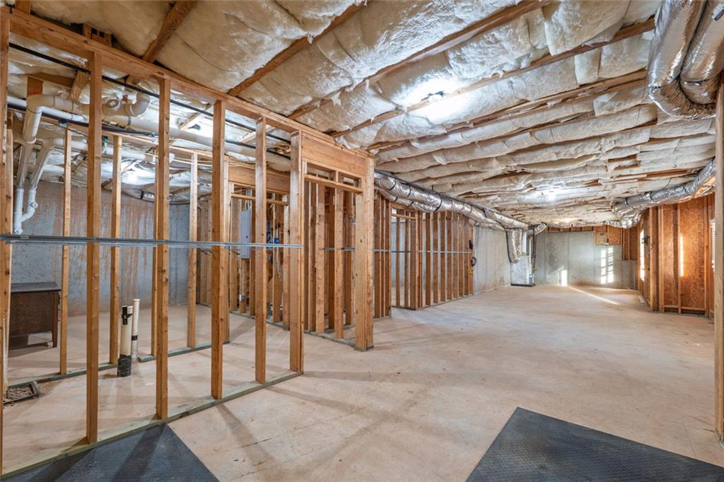 1280 Hidden Creek Point Cumming, GA 30040 - Photo 42 of 62 a view of empty room with wooden floor