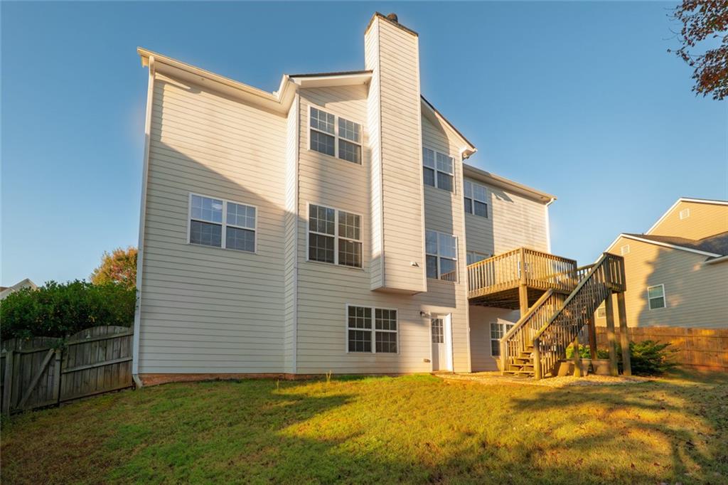 1280 Hidden Creek Point Cumming, GA 30040 - Photo 51 of 62 a view of a house with backyard
