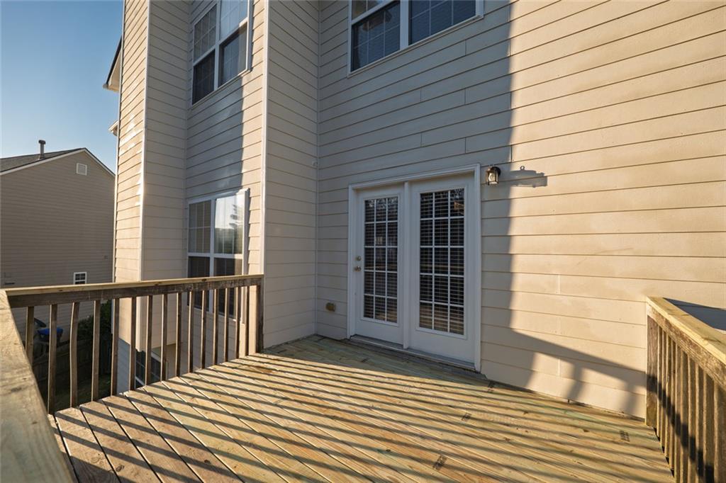 1280 Hidden Creek Point Cumming, GA 30040 - Photo 54 of 62 a view of a house with a balcony