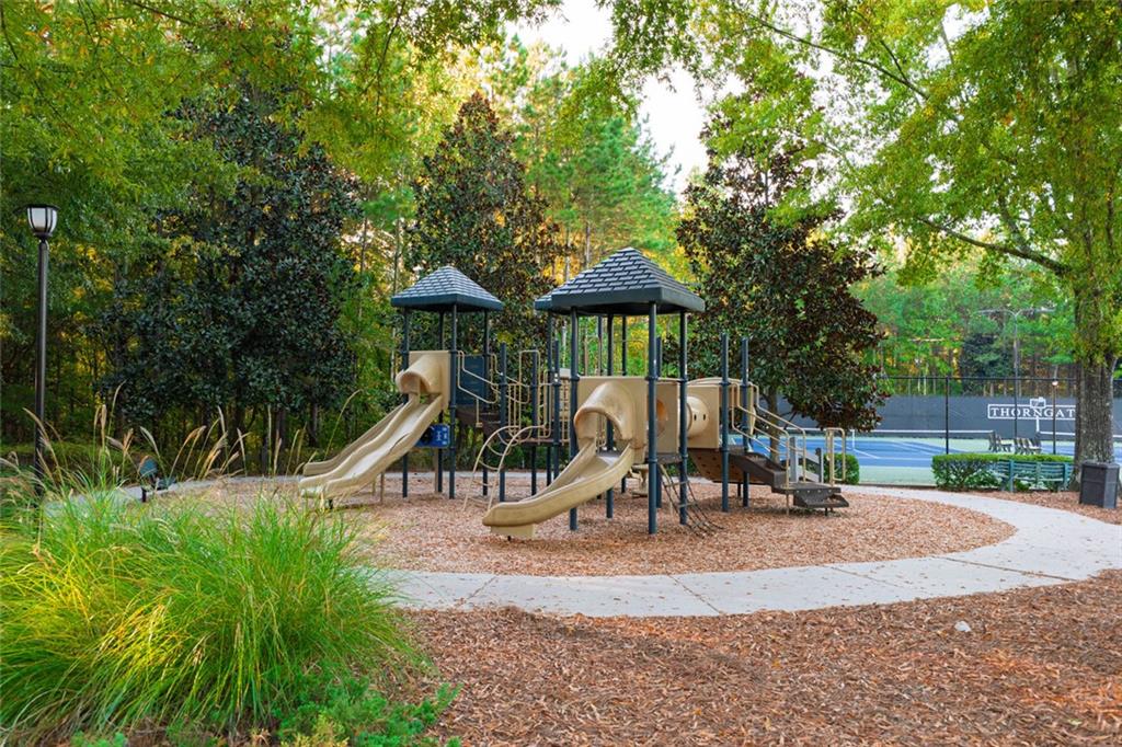 1280 Hidden Creek Point Cumming, GA 30040 - Photo 56 of 62 a view of a park with slide