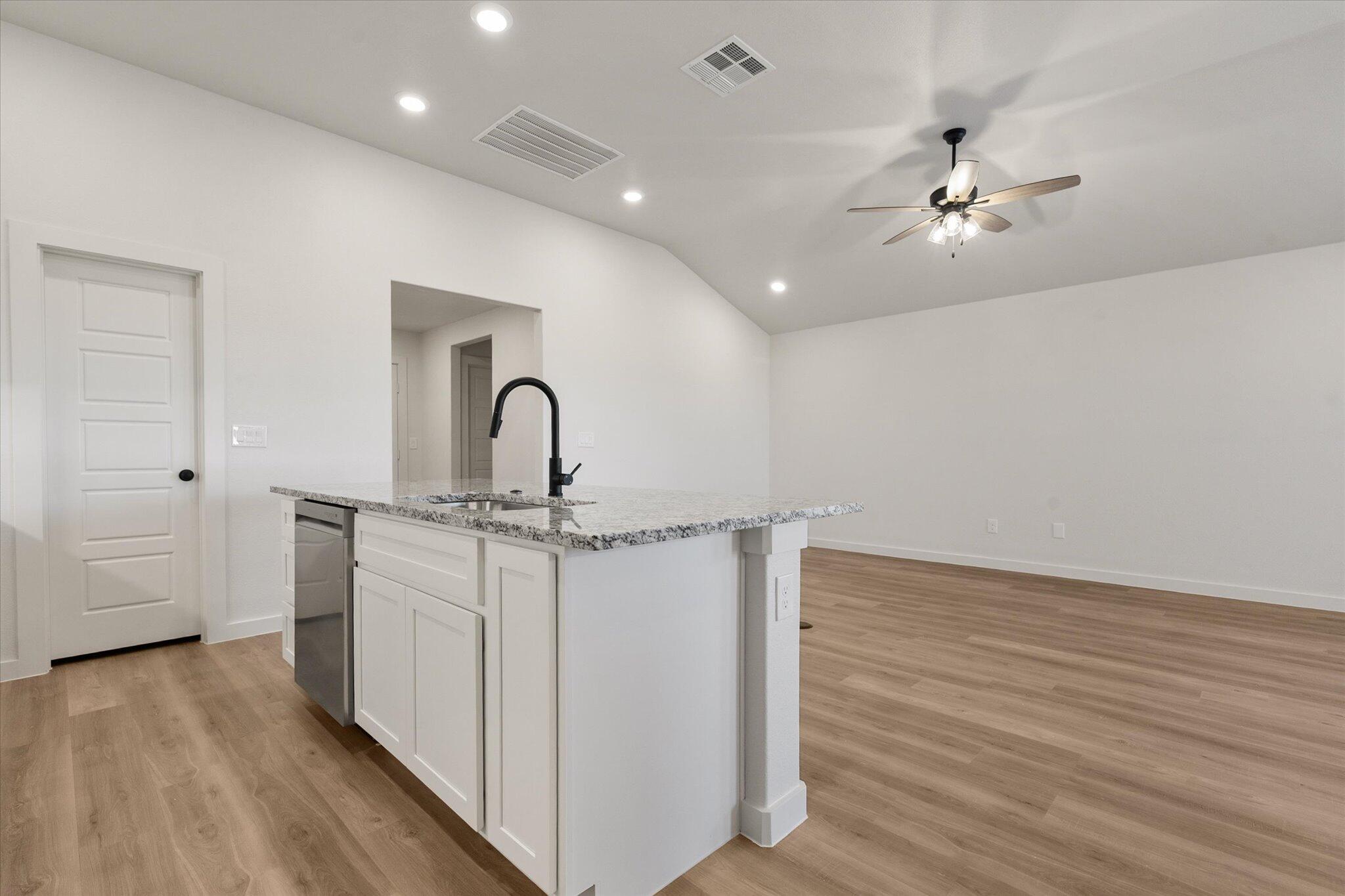 3114 138th Place Lubbock, TX 79423 - Photo 10 of 21 a very nice looking room with wooden floor