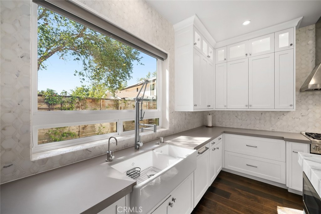 2207 San Luis Drive San Luis Obispo, CA 93401 - Photo 15 of 58 a large white kitchen with a large window