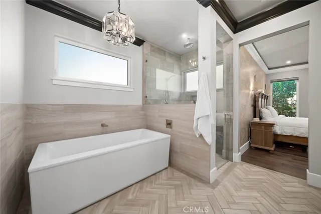 a bathroom with a toilet sink and shower