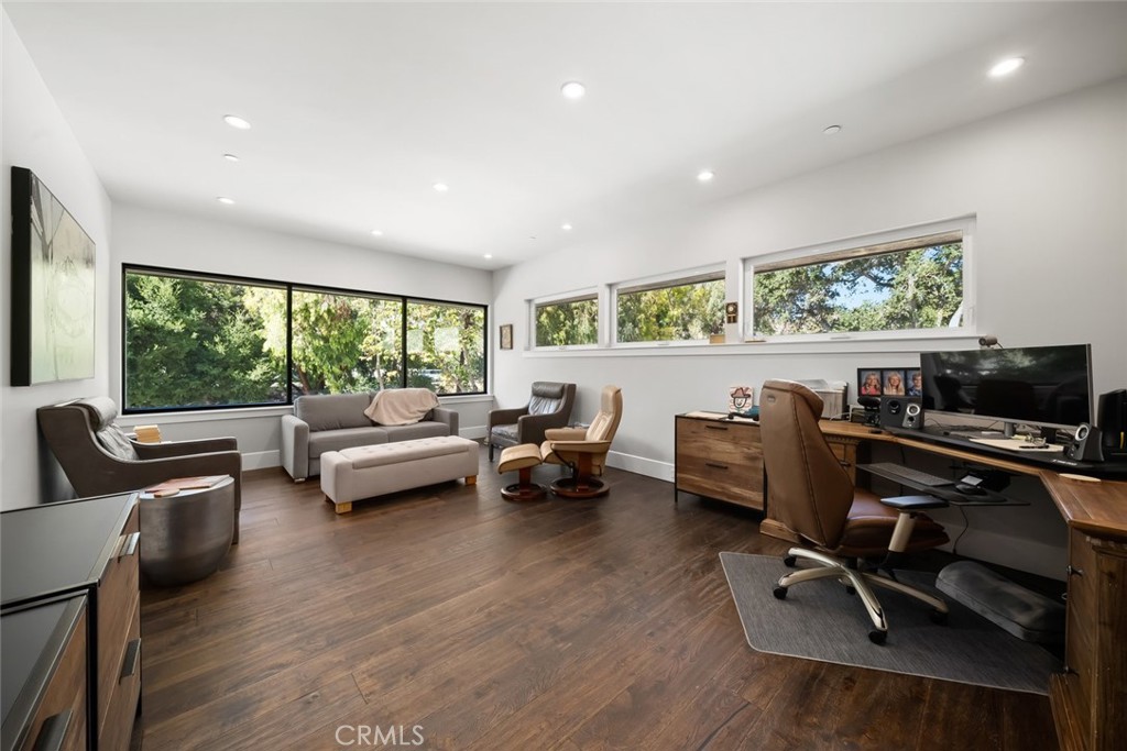2207 San Luis Drive San Luis Obispo, CA 93401 - Photo 38 of 58 a living room with furniture a flat screen tv and a large window