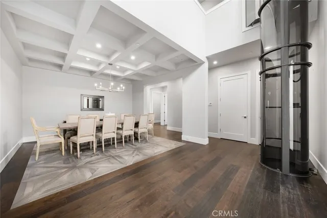 a view of a dining room with furniture and window