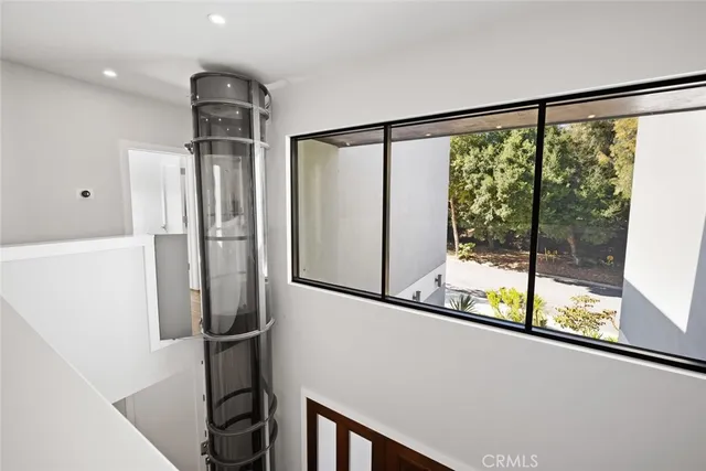 a spacious bathroom with a double vanity sink and a mirror