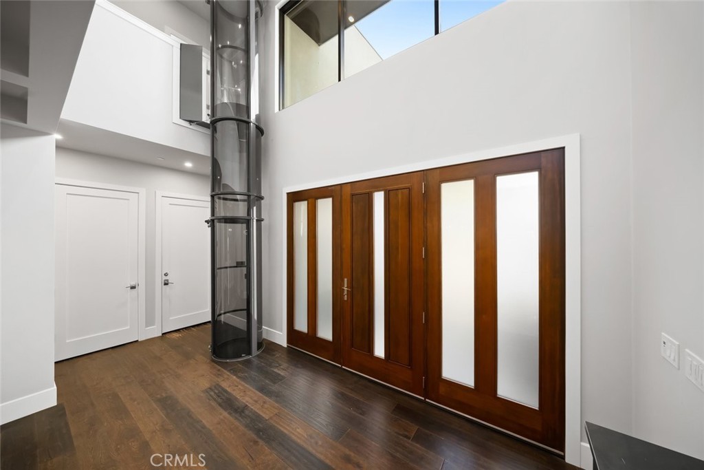 2207 San Luis Drive San Luis Obispo, CA 93401 - Photo 6 of 58 a view of a hallway with wooden floor and staircase